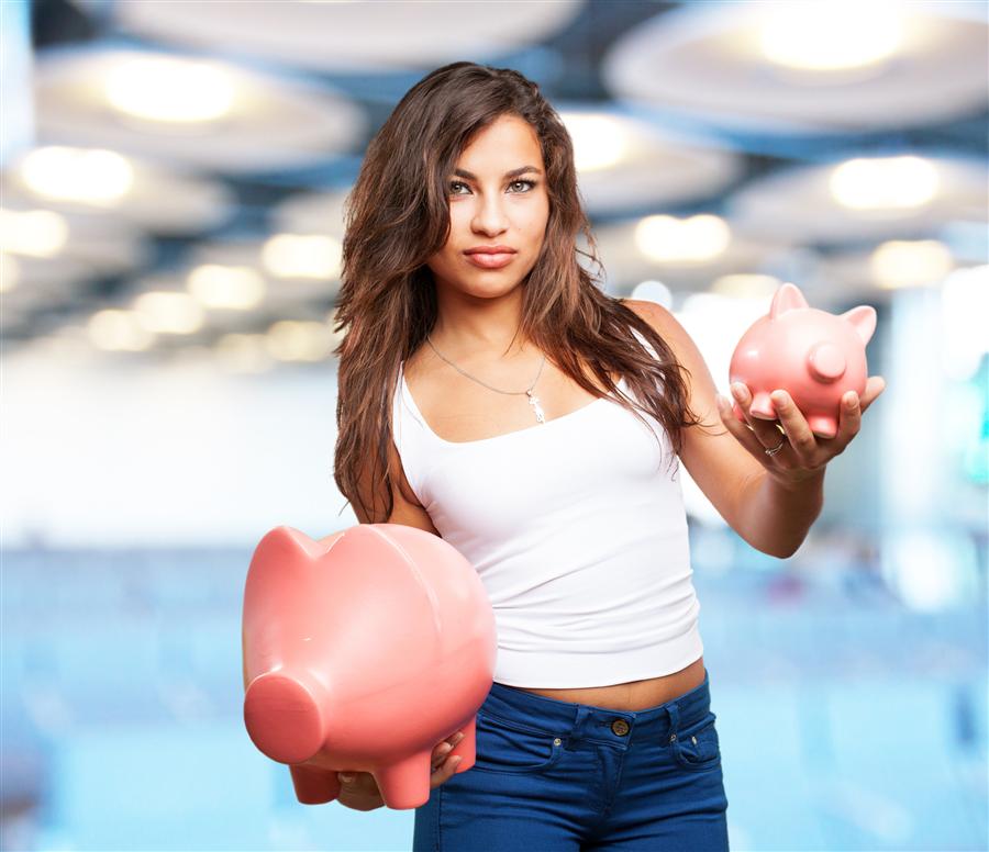 Guest holding a savings piggy bank